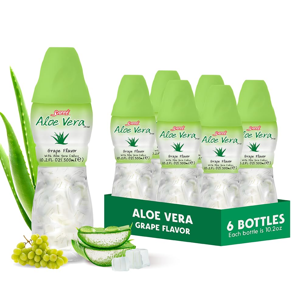 Jus d'aloe vera (arôme de grape) avec des morceaux plus gros de pur pulpe d'aloe (6 paquets) Jus à base de plantes excellent pour l'hydratation et contient une grande pulpe d'aloès. Il est sain pour les adultes et les enfants